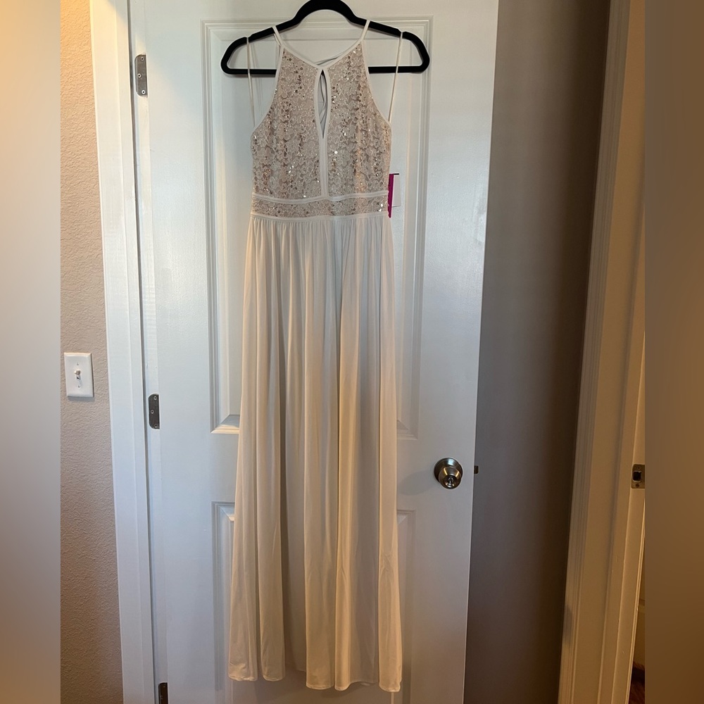 NEVER WORN. new with tags. bought for a formal in college. size 4
